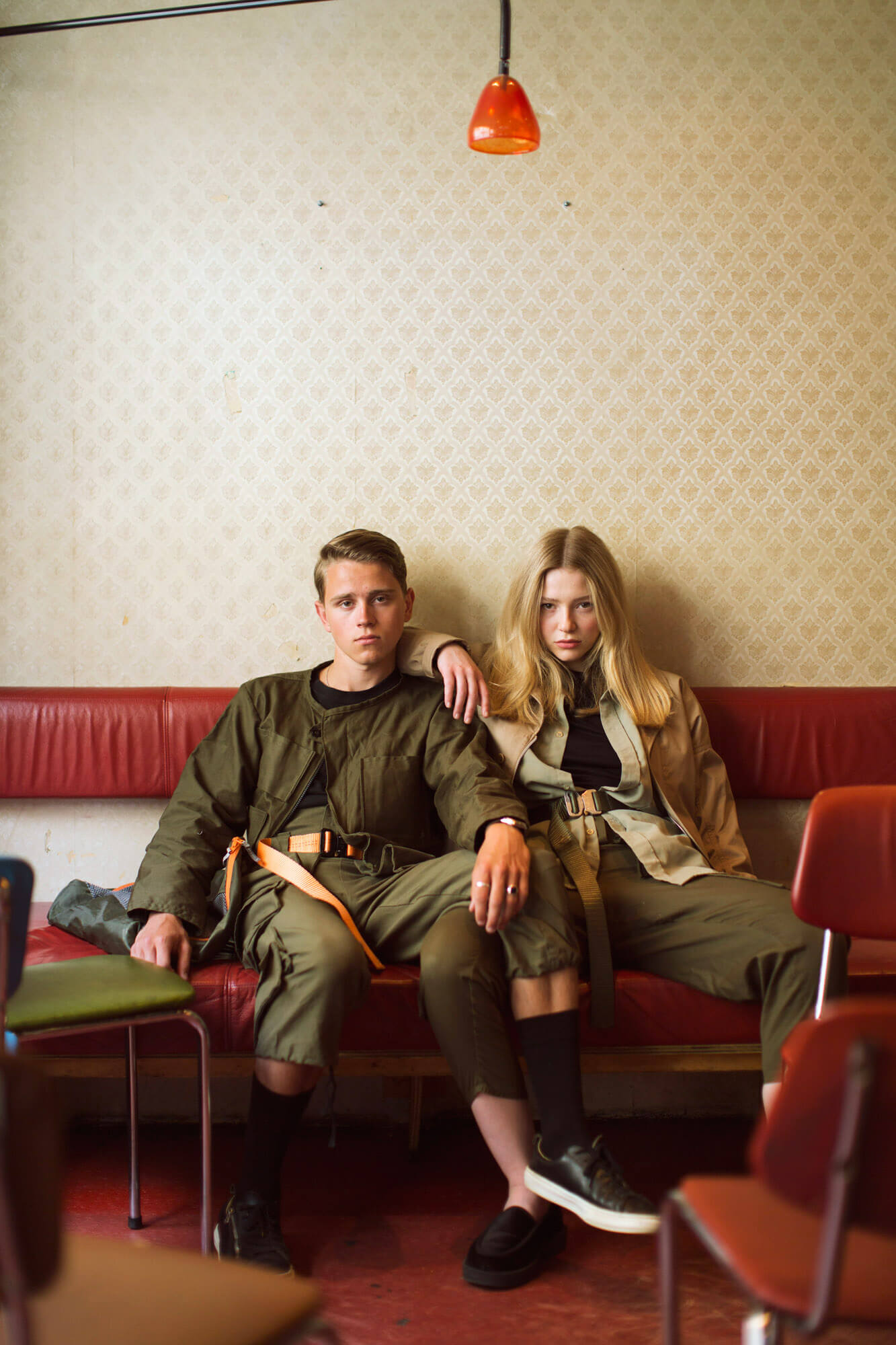 Young man and woman wearing green